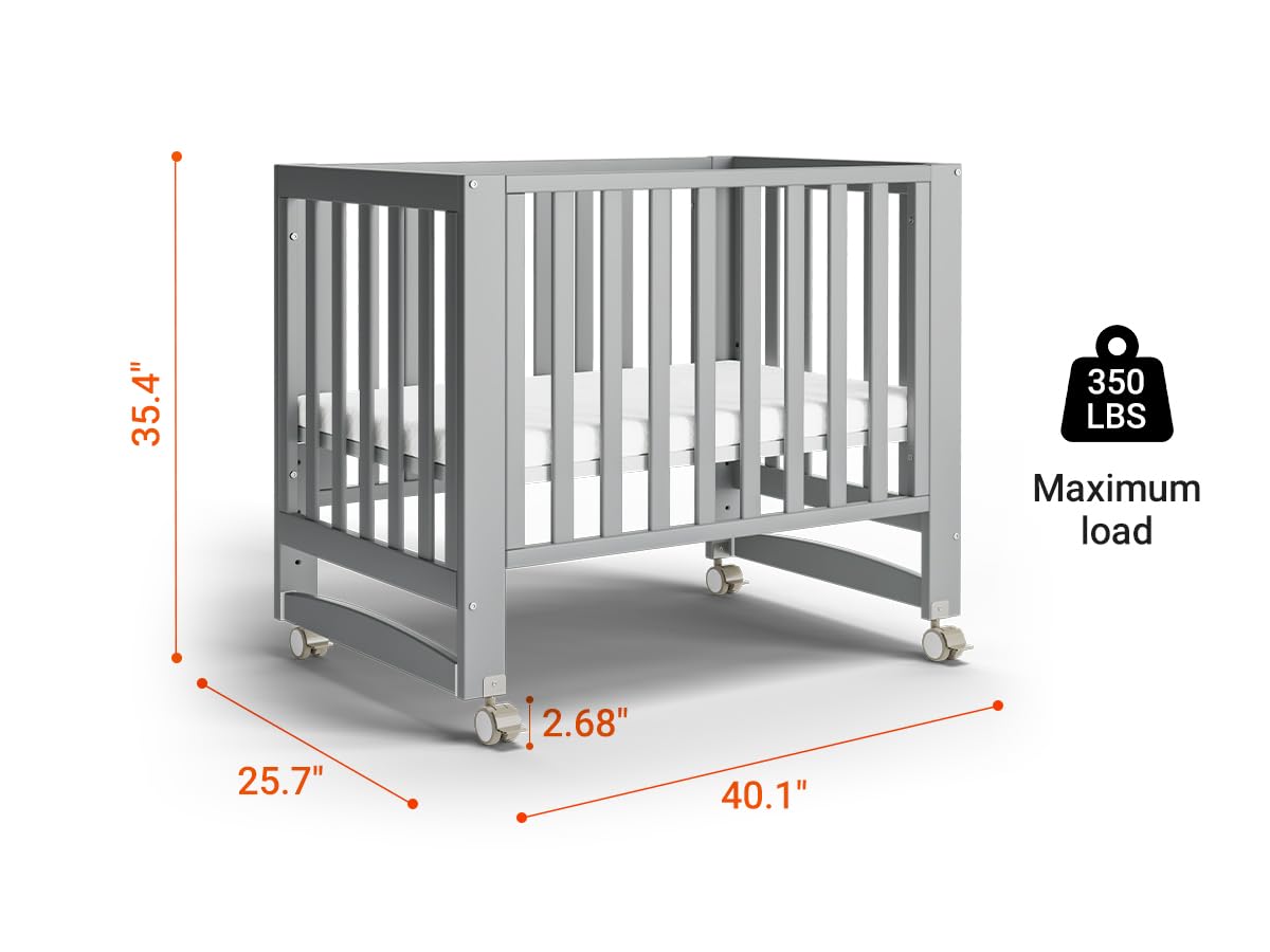 6-in-1 Convertible Mini Crib with Wheels