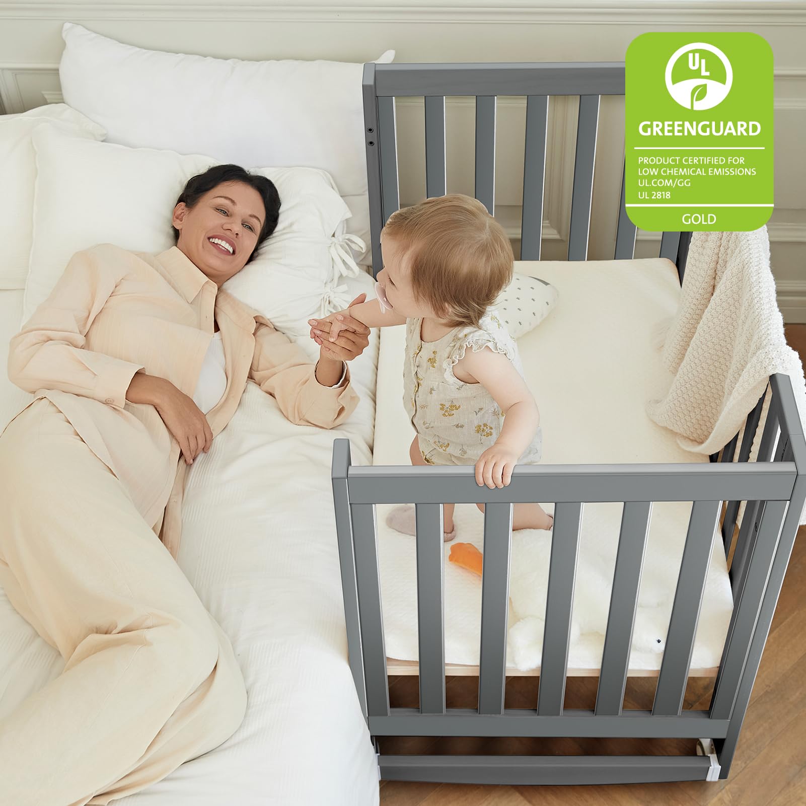 6-in-1 Convertible Mini Crib with Wheels
