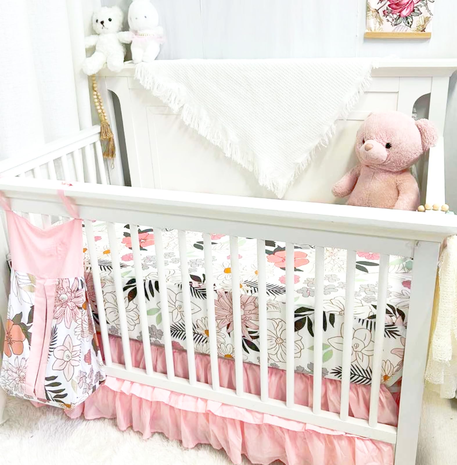 4-Piece Crib Bedding Set for Girls with Quilt, Sheet, Skirt and Diaper Stacker