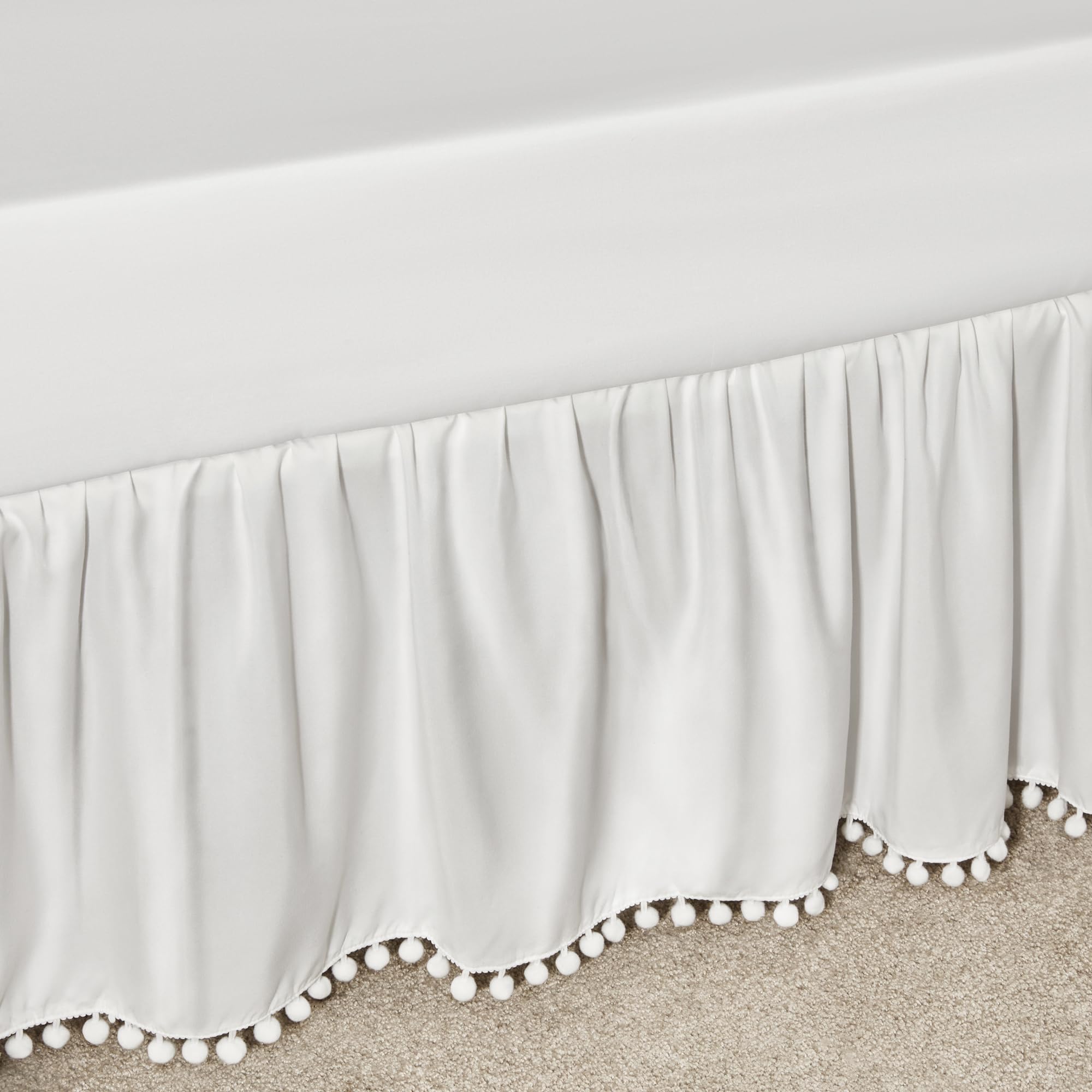 TILLYOU Baby Crib Skirt Girls Boys, Ruffled Bed Skirt with Pompoms, 28”x 52”, 14'' Drop, White