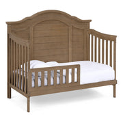 Simmons Kids Asher 6-in-1 Convertible Crib with Toddler Rail, Aged Oak