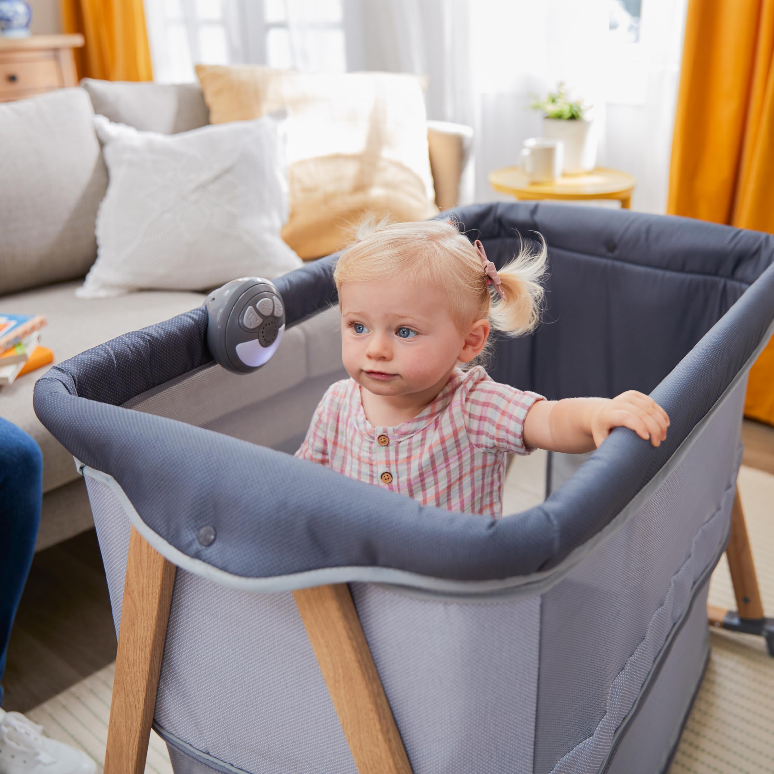 Rest-and-Romp 2-in-1 Bassinet and Play Yard with Soothing Sounds