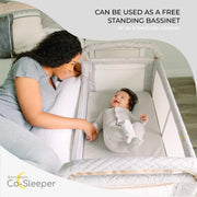 Arm’s Reach Clear-Vue Co-Sleeper Bedside Bassinet Featuring Clear Mesh Panels with Fold-Down Side, Large Attached Storage Basket, 4 Wheels, and Height-Adjustable Legs, White