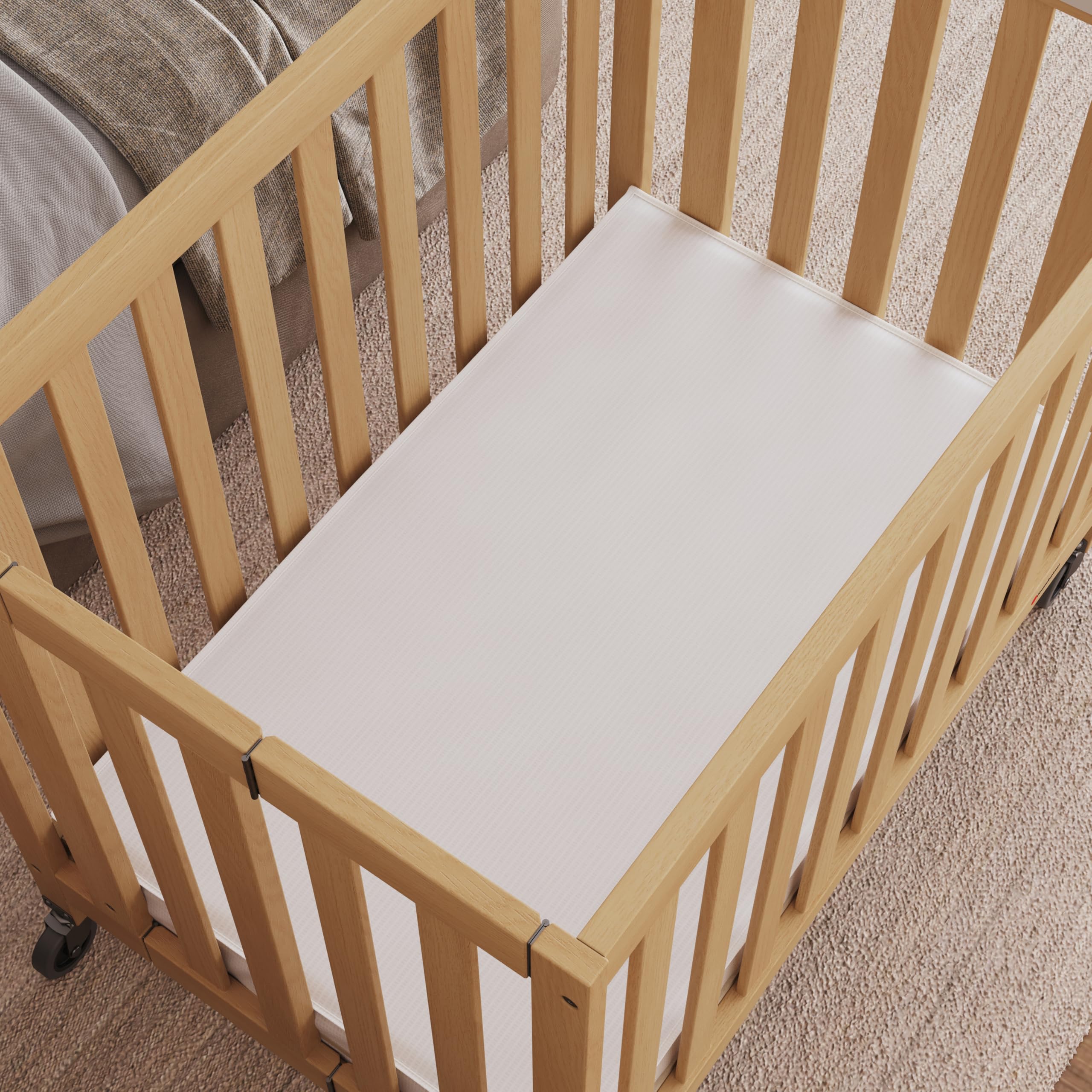 Compact Folding Crib with Foam Mattress and Casters