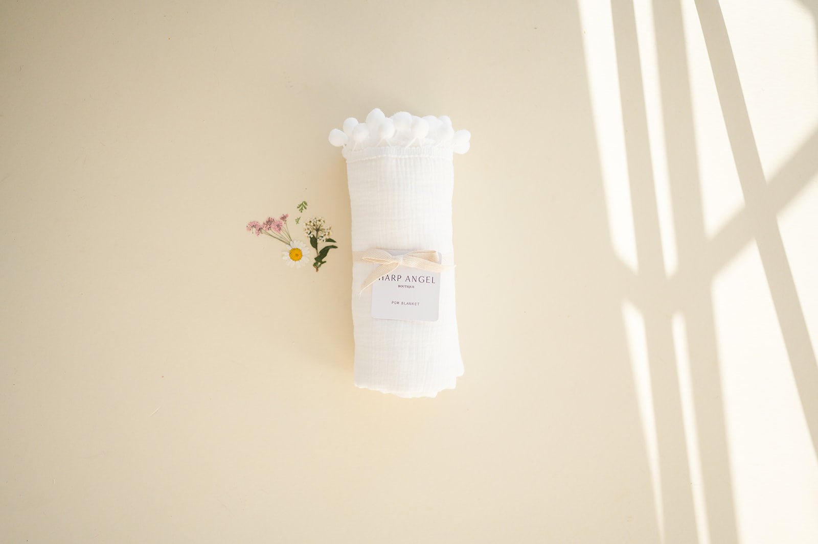 White Pom Muslin Swaddle Blanket